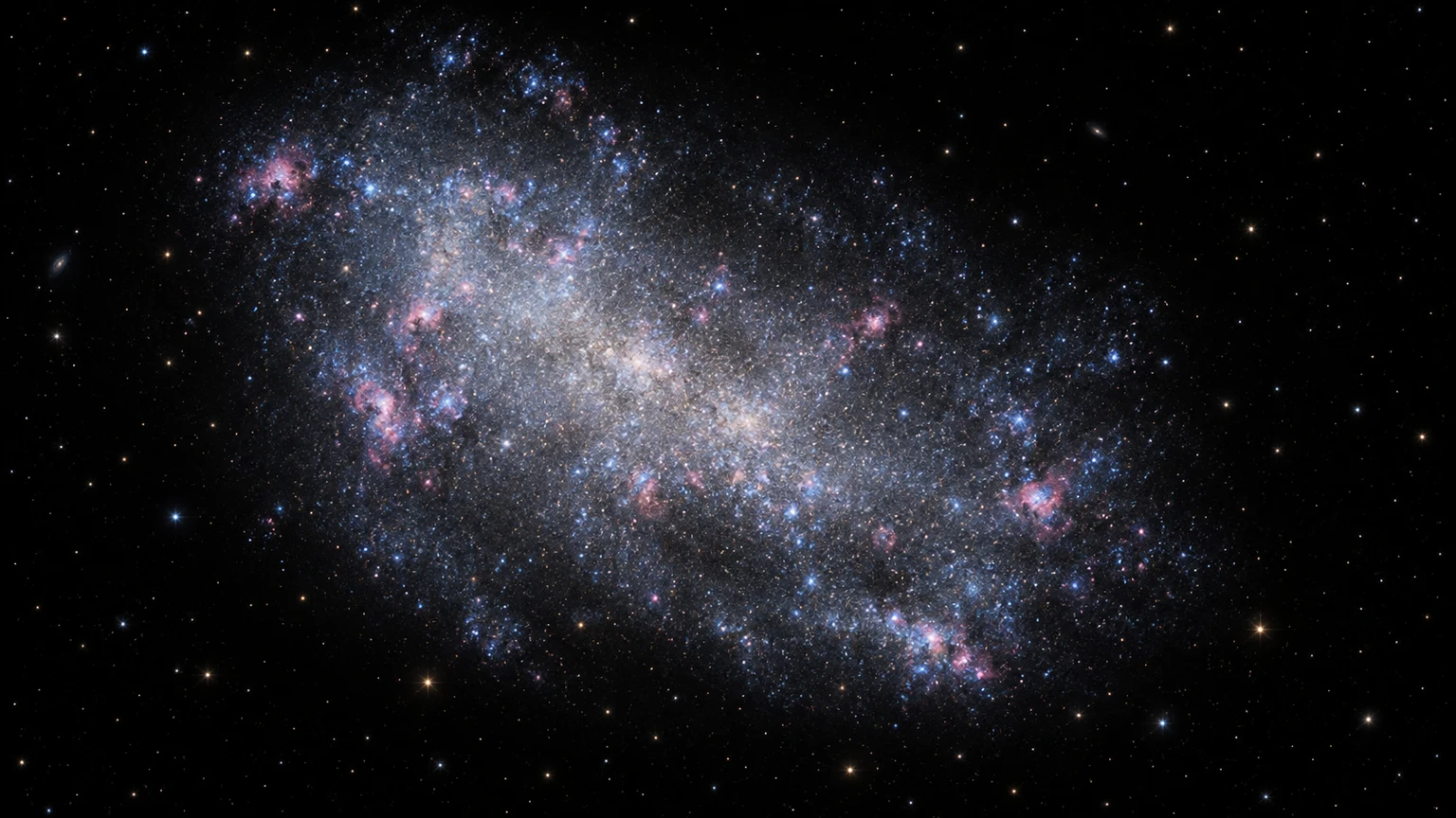 Artist’s reconstruction of IC 1613’s diffuse stars and scattered gas clouds. Not a telescope photograph.