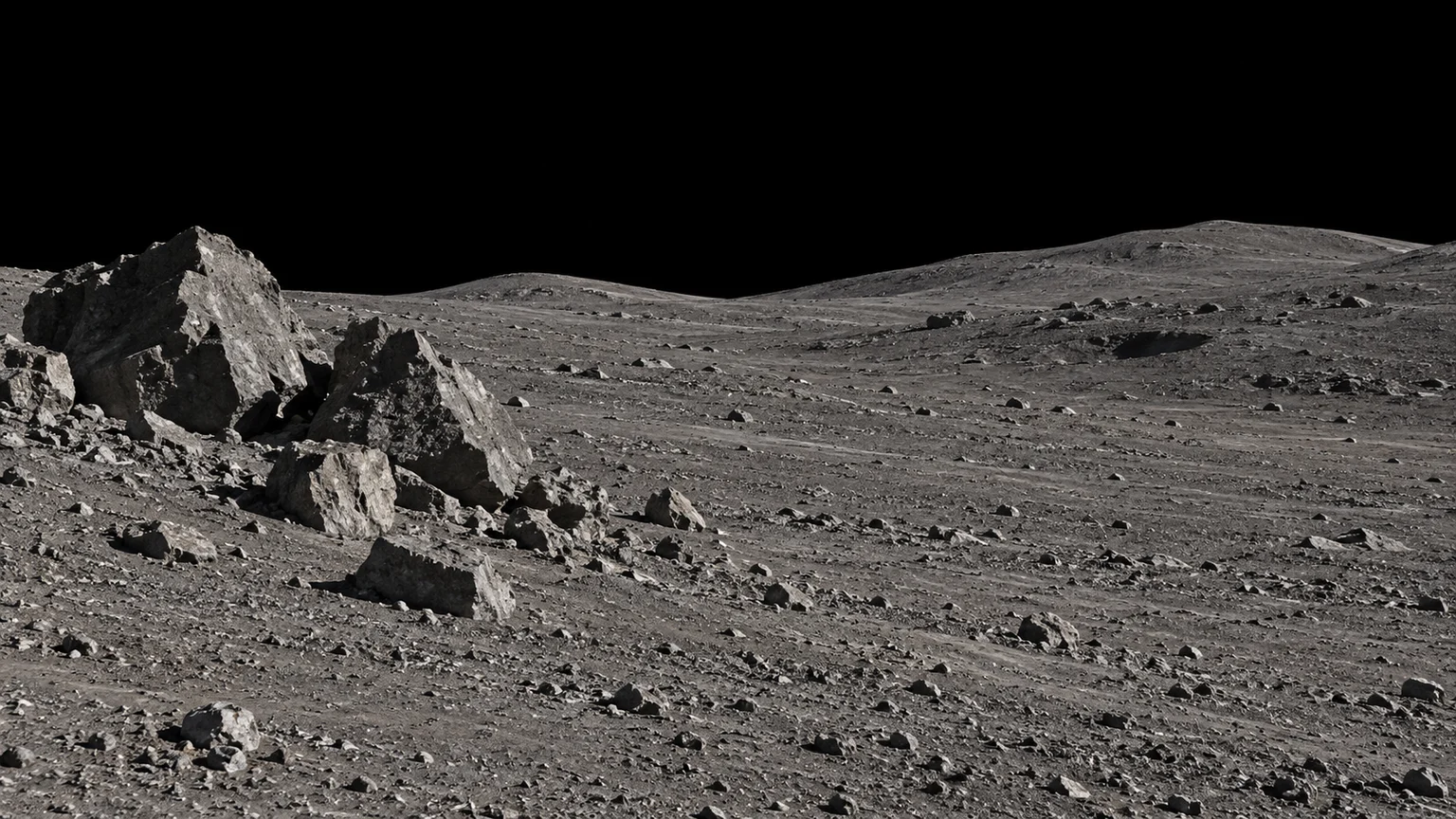 A speculative ground-level view on Lysithea. The depressions, fragments and horizon are artistic interpretations.