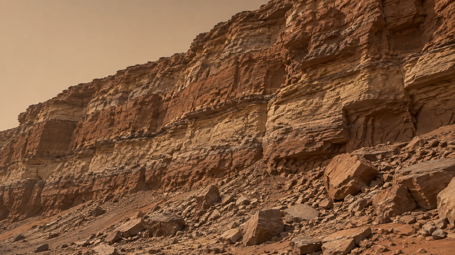 A tall eroded sedimentary wall with rusty and buff strata, talus at its foot and a narrow strip of dusty tan sky. An artistic reconstruction of Mars; local detail, lighting and viewpoint are imagined.