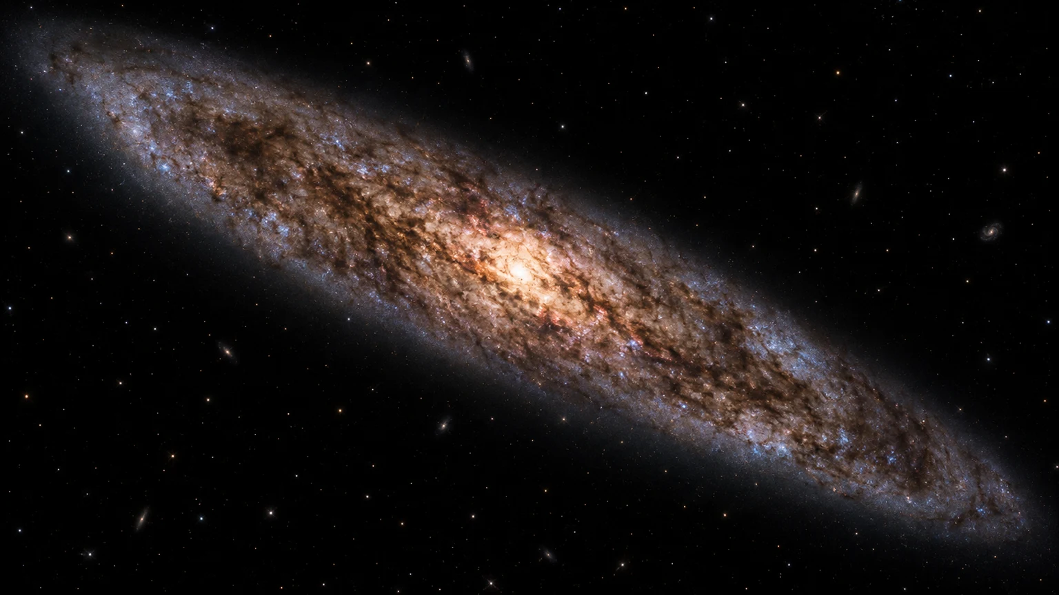 Artist’s reconstruction of NGC 253’s highly inclined disk and intricate dust lanes. Not a telescope photograph.